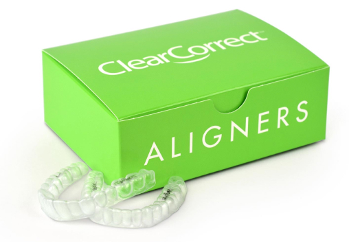 green ClearCorrect Aligners box for ClearCorrect aligners with two sample aligners displayed next to the box